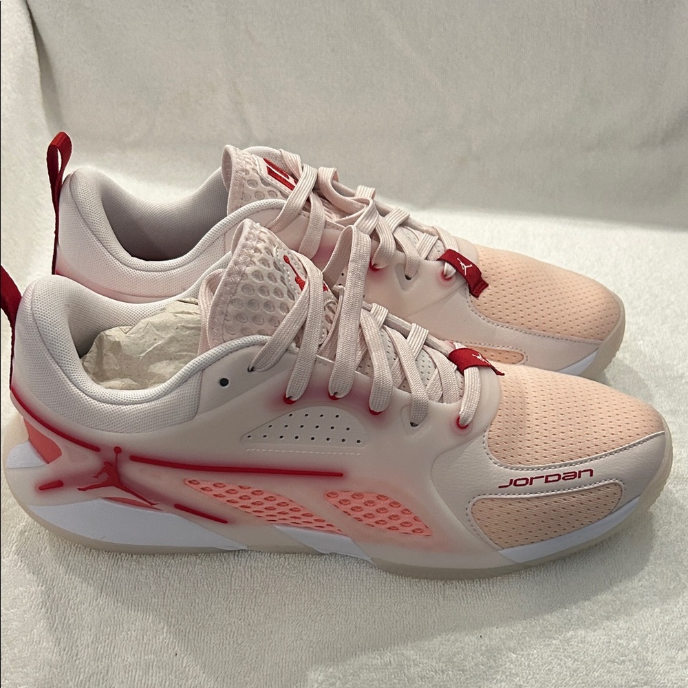 Women’s Jordan Heir size 12 . Pink  / Varsity Red.